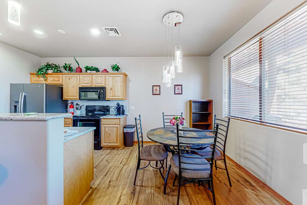 Scenic mountain condo with balcony, gas grill, smart TVS, central air, & W/D