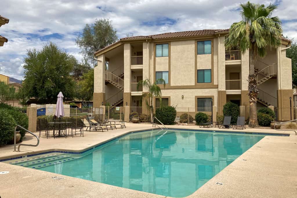 Dog-friendly mountain view condo with pool, gym, grill, fireplace, & sunroom