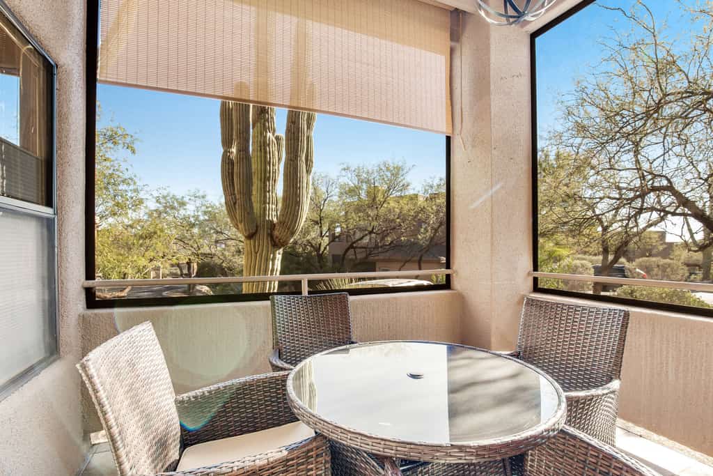 Radiant retreat with pool and hot tub access, sunroom, washer/dryer, gym, & AC