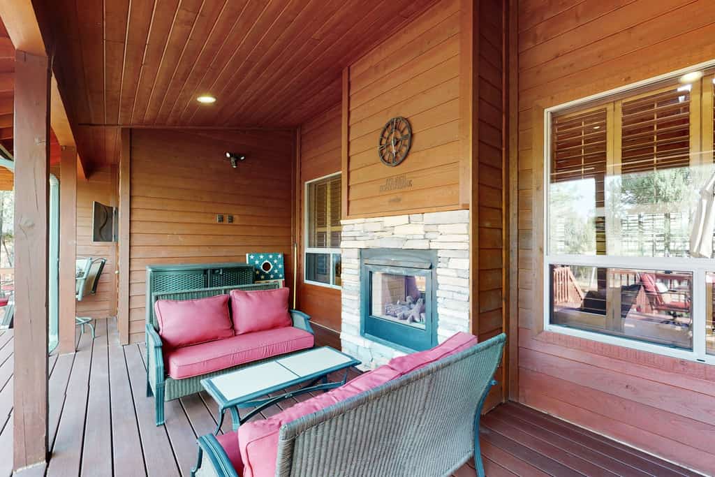 Spacious home with fireplace, multiple patios, balcony & grill