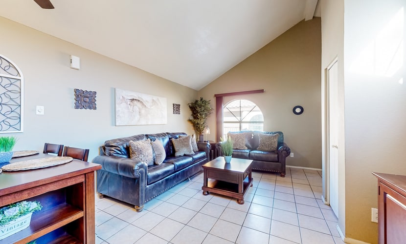 Gated-entry condo with central location, central AC, & private W/D