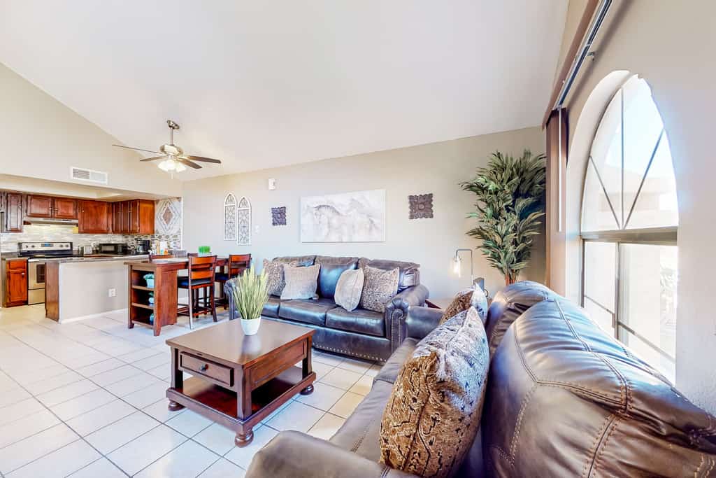 Gated-entry condo with central location, central AC, & private W/D