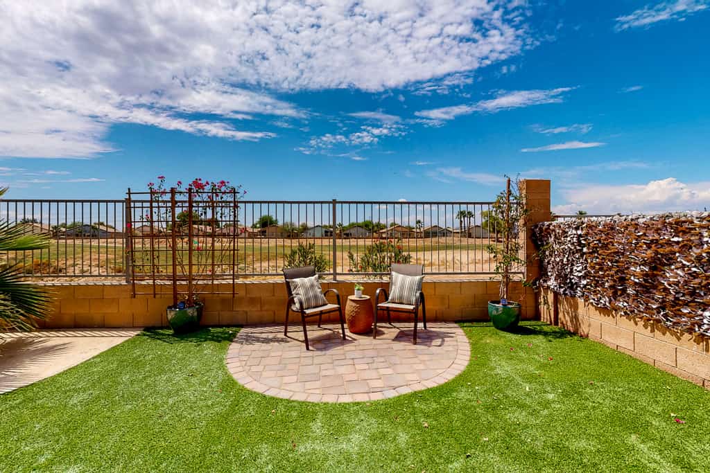 Single-level home with private pool, golf course views, pool table, & W/D