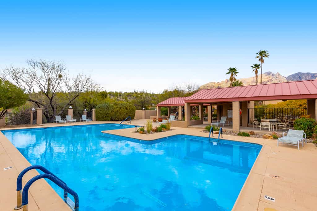 Inviting townhouse with pool, enclosed yard, patio, mountain view & W/D