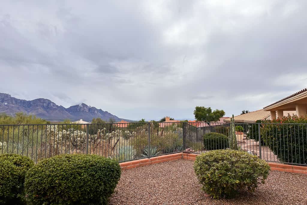 Mountain-view home with on-site pool/hot tub, private yard, patio