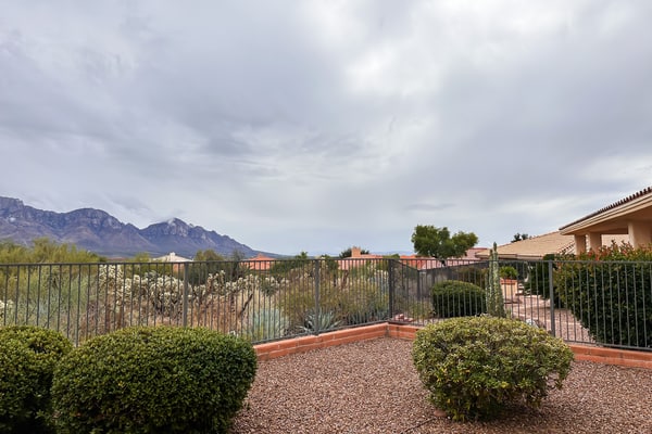 Mountain-view home with on-site pool/hot tub, private yard, patio