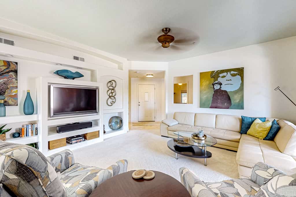 Second-floor condo with heated pool, hot tub, balcony, central AC & washer/dryer