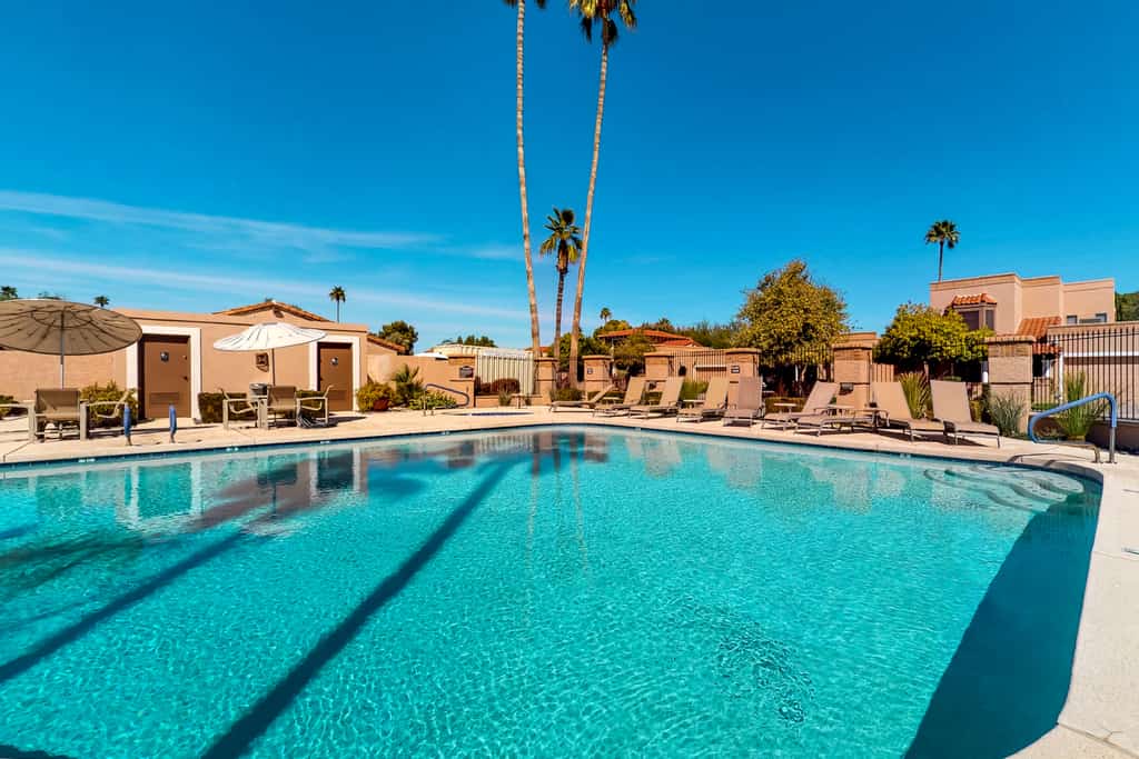 Beautiful waterfront home w/ private patios, shared pools, hot tub