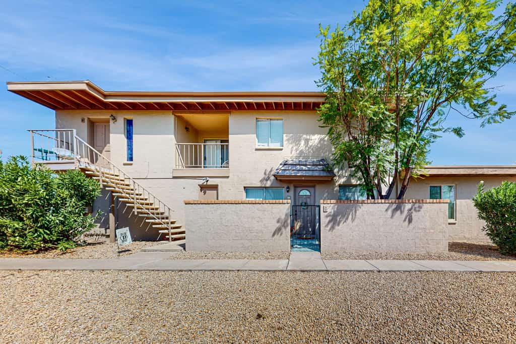 Modern townhome with pool, AC, W/D, grill, and private patio