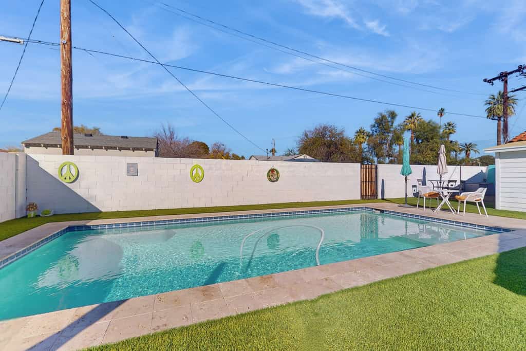 Sunny downtown home with private pool, hammock, enclosed backyard, grill, patio