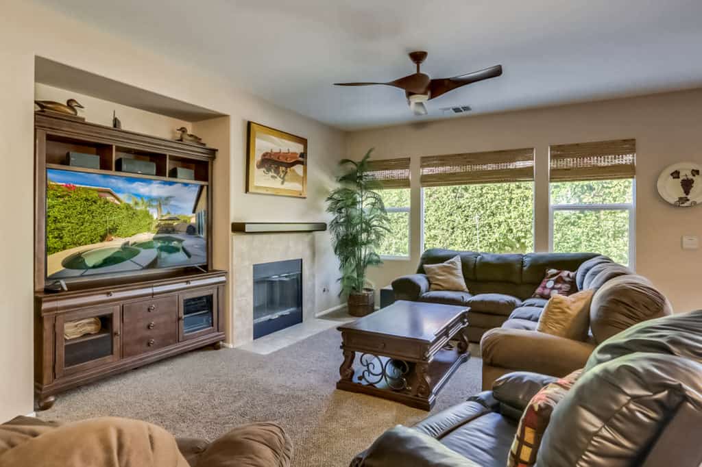 Classic, dog-friendly home near golf with heated pool, enclosed yard & fireplace