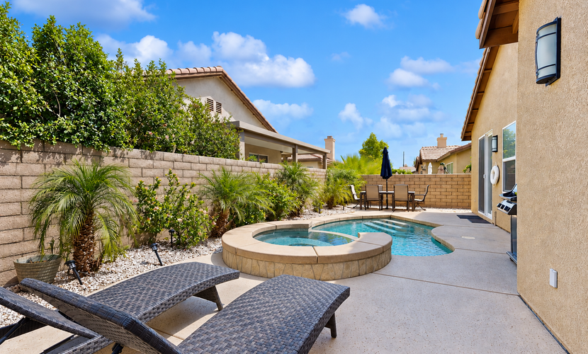 Classic, dog-friendly home near golf with heated pool, enclosed yard & fireplace