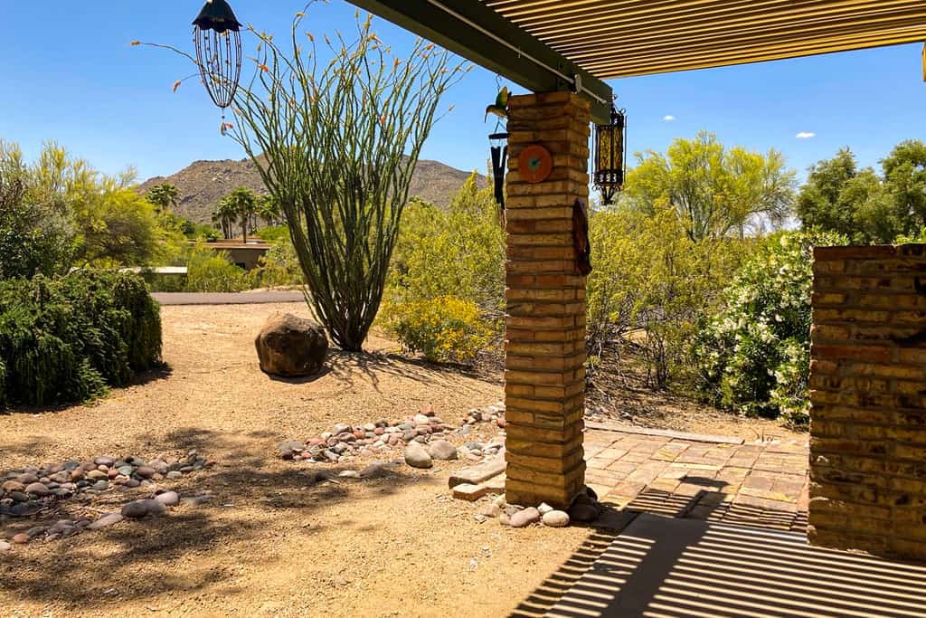Ground-floor condo with on-site pool, grills, patio, & central AC