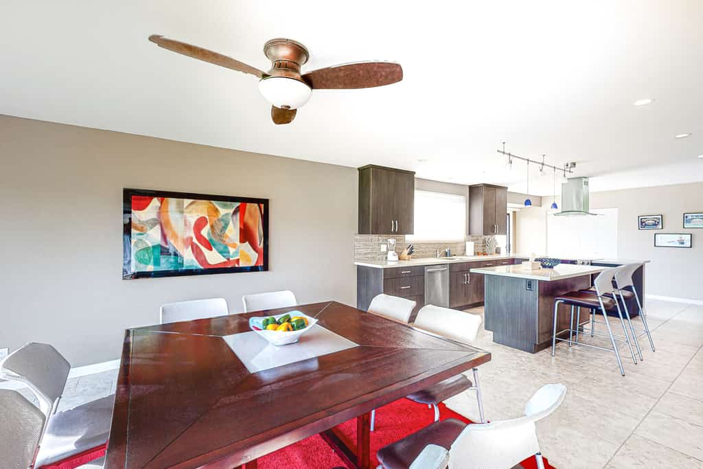 home w/ a patio & shared pool plus fairway & mountain views