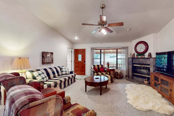 Two-story home with game room, large deck, bbq grill, & yard