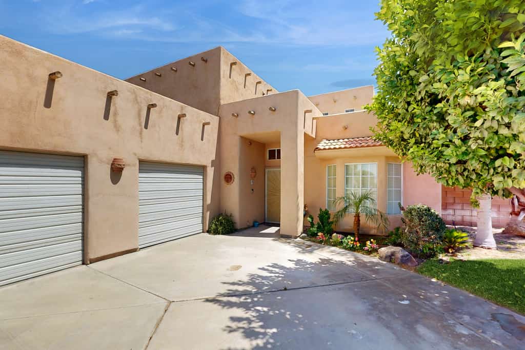 Expansive home with fireplace, heated pool & and spa in backyard haven