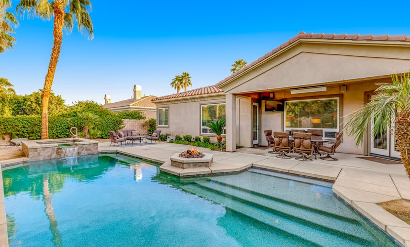 Dog-friendly desert style home with sprawling pool, pool spa, firepit & grill