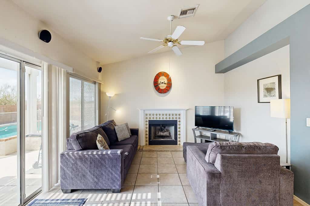 Sun-filled dog-friendly home with private pool, putting green, & mountain views