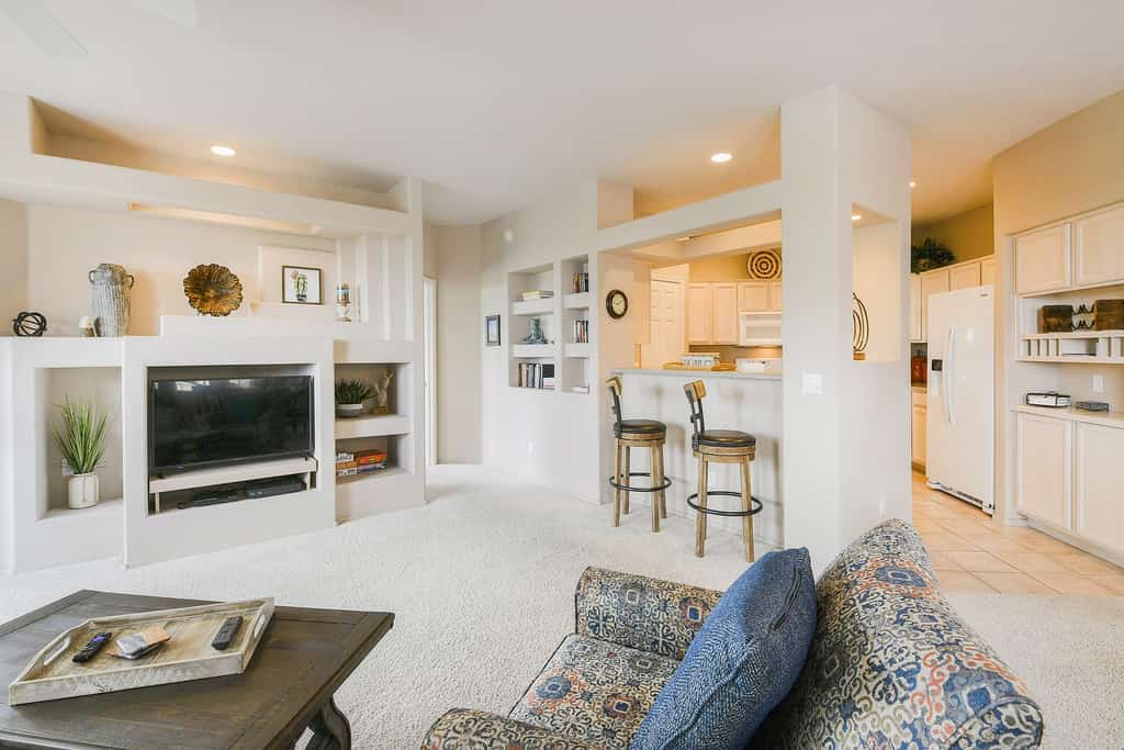 Mountain-view condo with incredible sunset views, pool, hot tub & grill