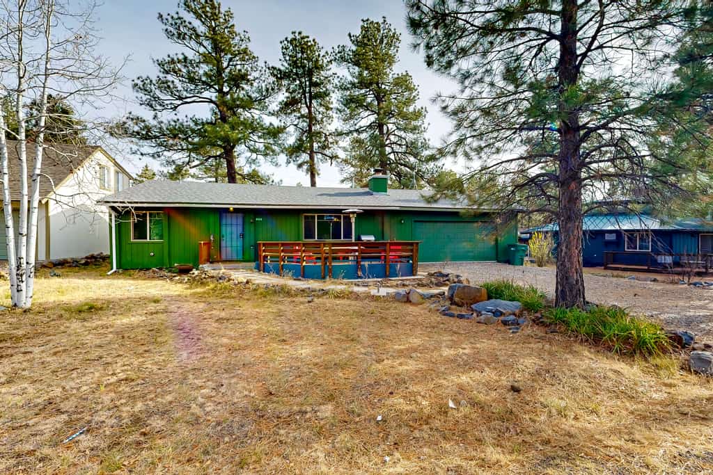 Dog-friendly rustic retreat with enclosed yard, grill, wood stove, games, & W/D