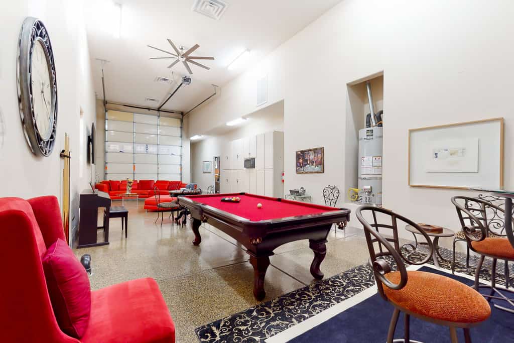Luxe and spacious retreat with a pool, pool spa, firepit, grill, game room, & AC