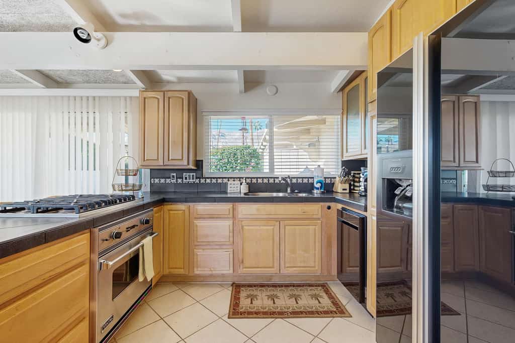Dog-friendly mountain view condo with pool, grill, open layout, AC, & internet