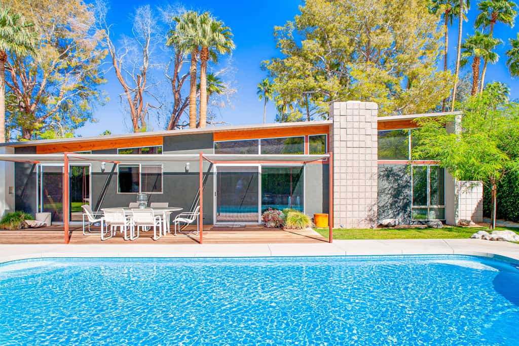 Elegant, mid-century Alexander butterfly home w/ pool & gas grill