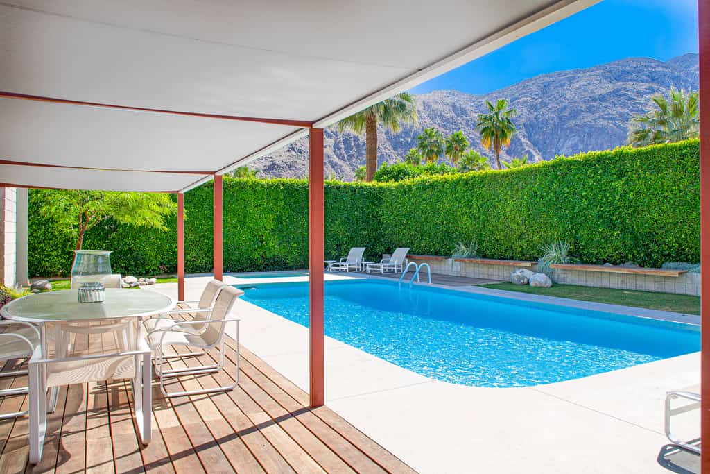 Elegant, mid-century Alexander butterfly home w/ pool & gas grill
