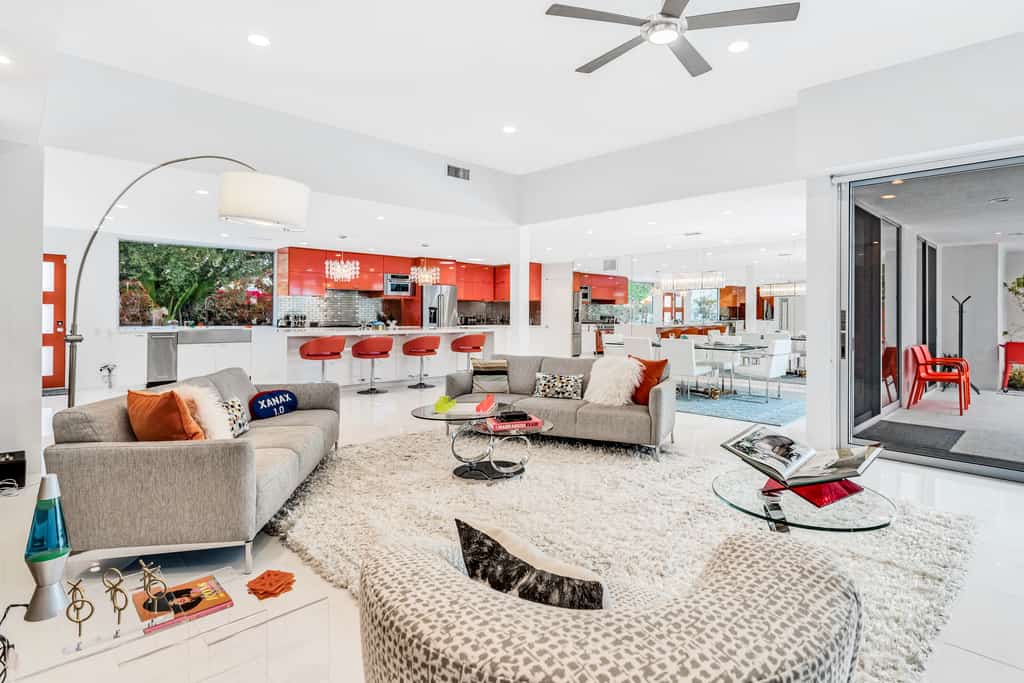 Mid-century modern estate with a pool, hot tub, gourmet kitchen, and fireplace