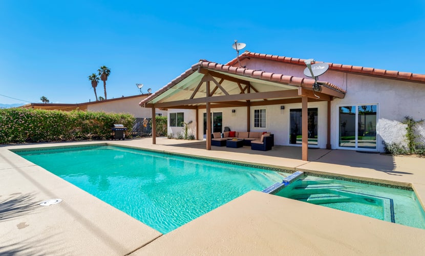 Dog-friendly home with pool, spa, enclosed yard, covered lanai, & fireplace