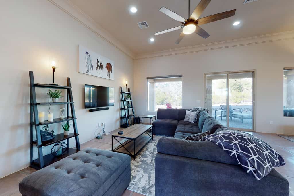 Updated home with mountain views, a private patio, grill, EV charger, W/D, & AC