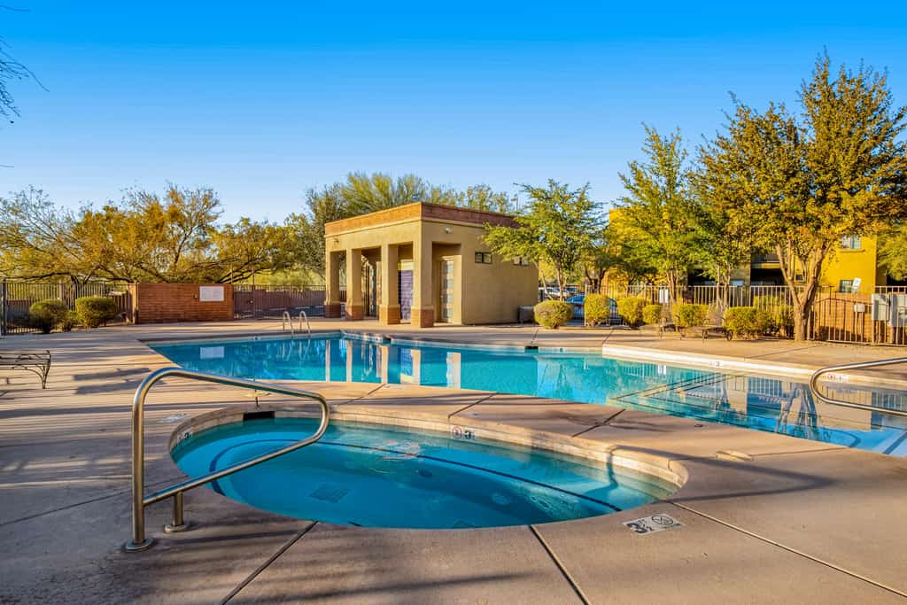 1st-floor condo with mountain views, pool, hot tub, private balcony, AC, & W/D