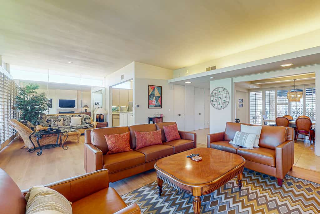 Iconic mid-century modern home with on-site pool access, grill, AC, & W/D