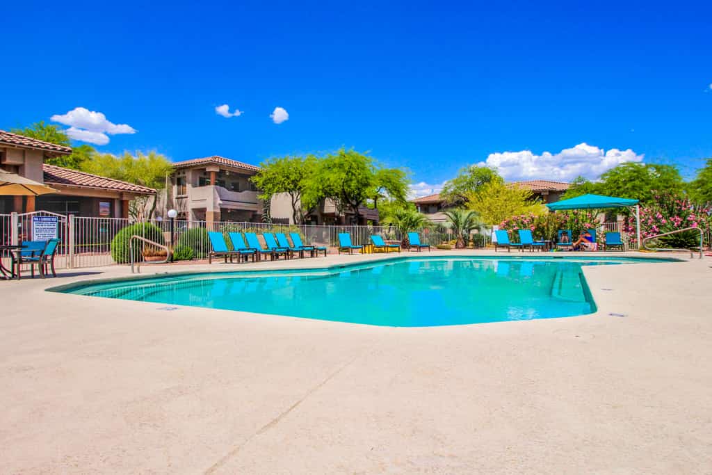 Dog-friendly, ground-floor condo with patio, desert views, pool, hot tub, & W/D