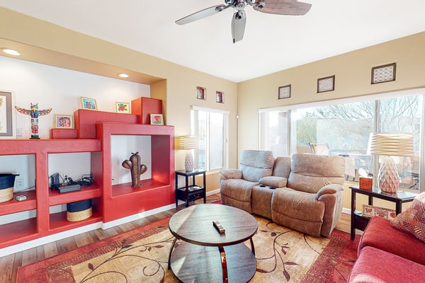 Sunny, dog-friendly condo with a heated pool, gym, grilling area, & golf nearby