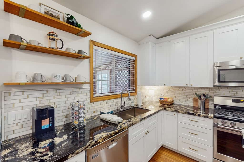 Dog-friendly home w/ covered patio, bbq grill, fenced yard, & central AC