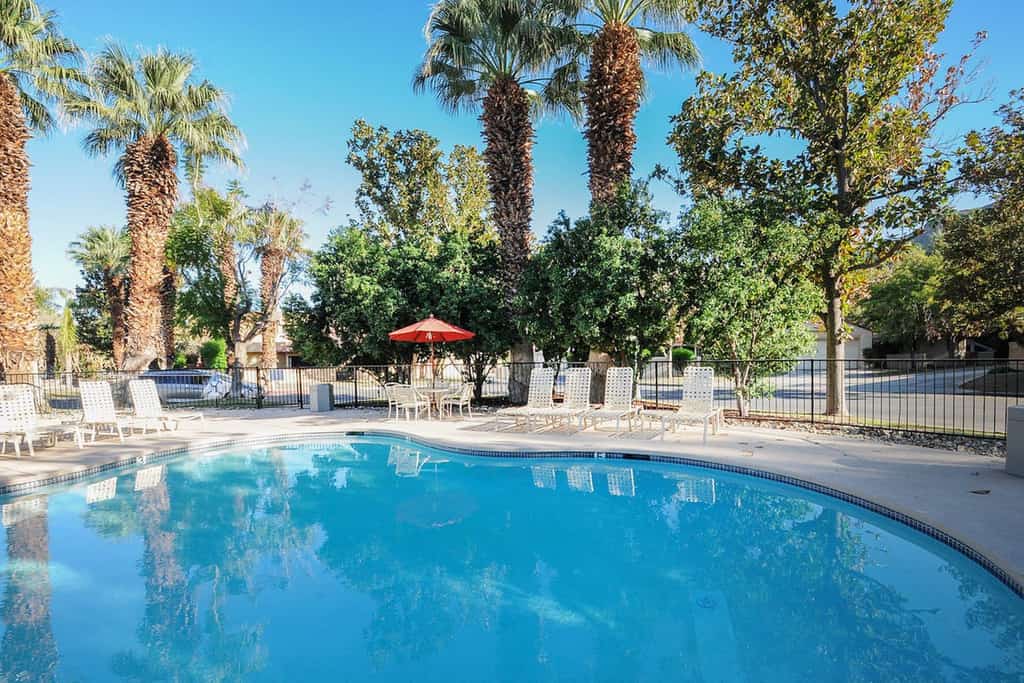 Beautifully updated mid-century condo with shared pool/spa & mountain views