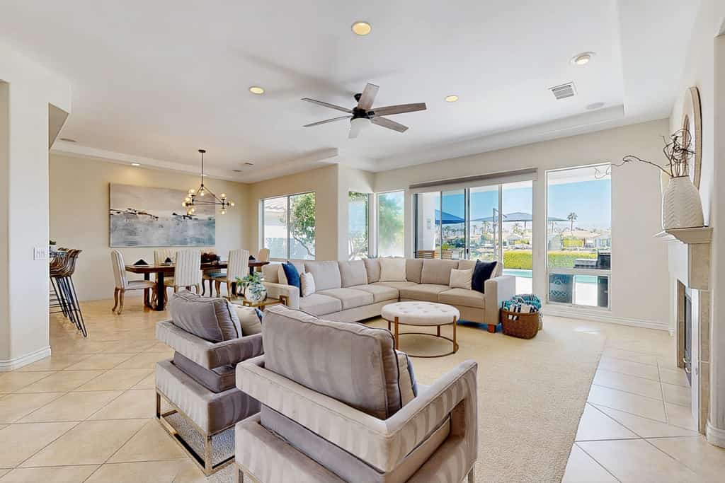 Waterfront, golf-view home w/ a private pool, pool spa, & outdoor dining area