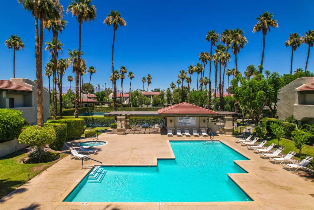 Charming, updated condo in great location with heated pool, tennis, hot tub, W/D