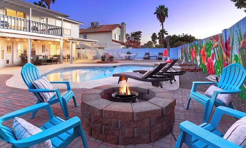Fun-filled, modern home with game room, heated pool, hot tub, grill
