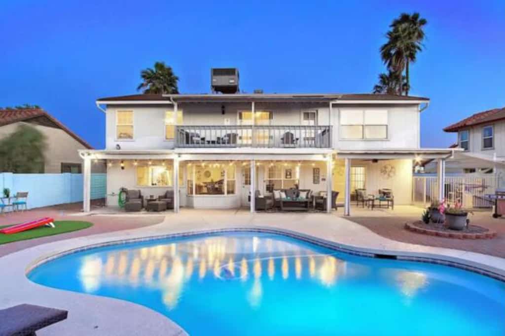 Fun-filled, modern home with game room, heated pool, hot tub, grill