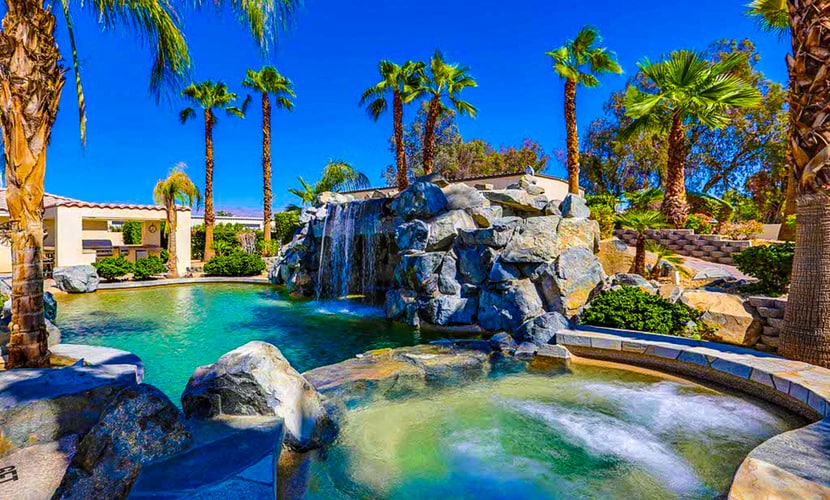 Luxurious home with an outdoor kitchen, private pool & spa - close to golf