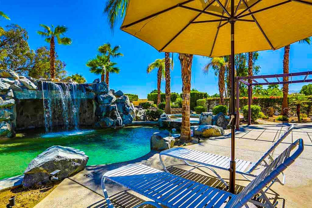 Luxurious home with an outdoor kitchen, private pool & spa - close to golf