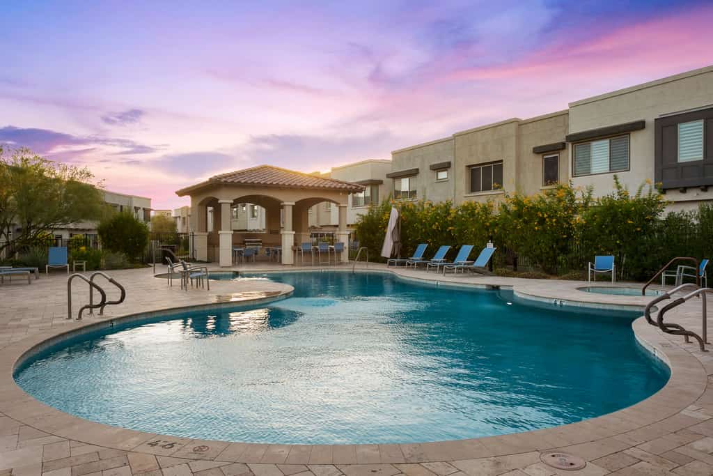 Modern townhome with private patio, grill, rooftop deck, on-site pool & gym