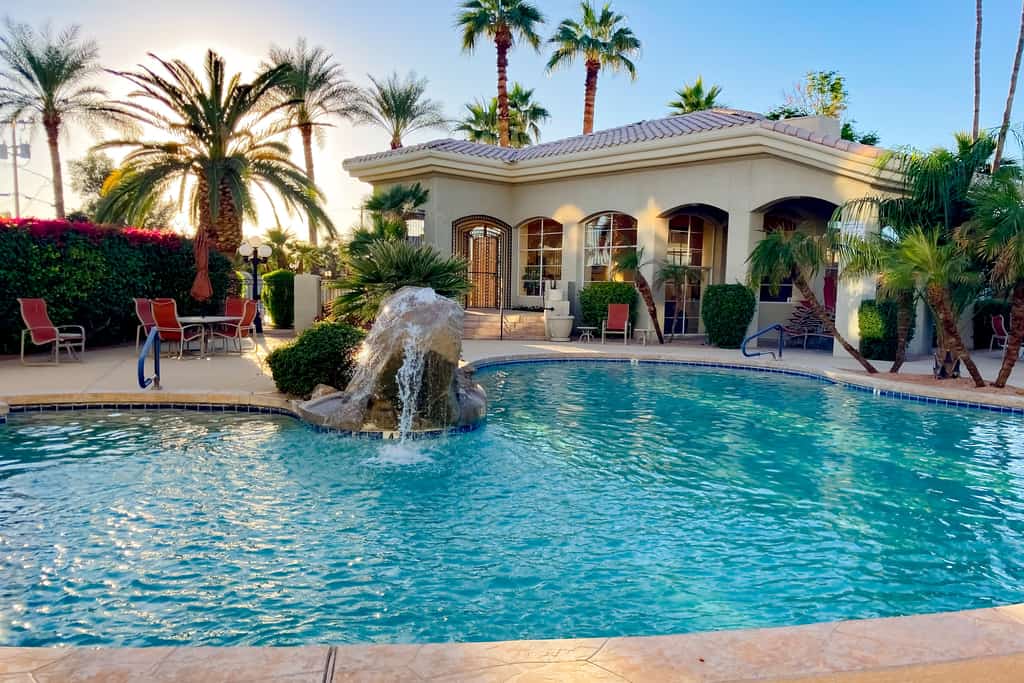 Inviting mountain-view condo with balcony - hot tub, heated pool & golf on-site