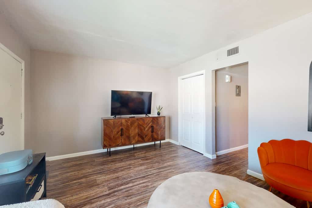 Dog-friendly condo near attractions with fenced yard, central AC, and cute decor