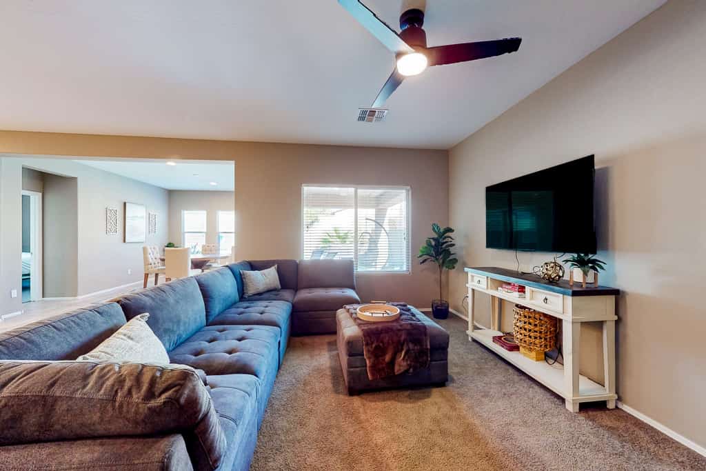 Single-story home with enclosed yard, private pool, hot tub, patio, & grill