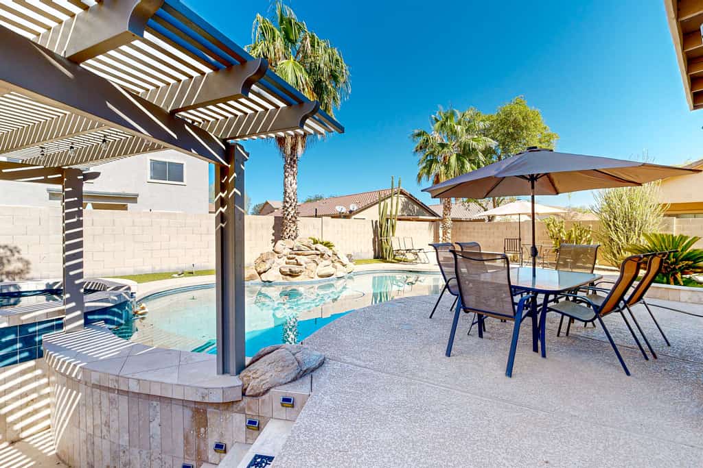 Home with private pool, spa, swim-up bar/grill, outdoor dining, firepit, & W/D