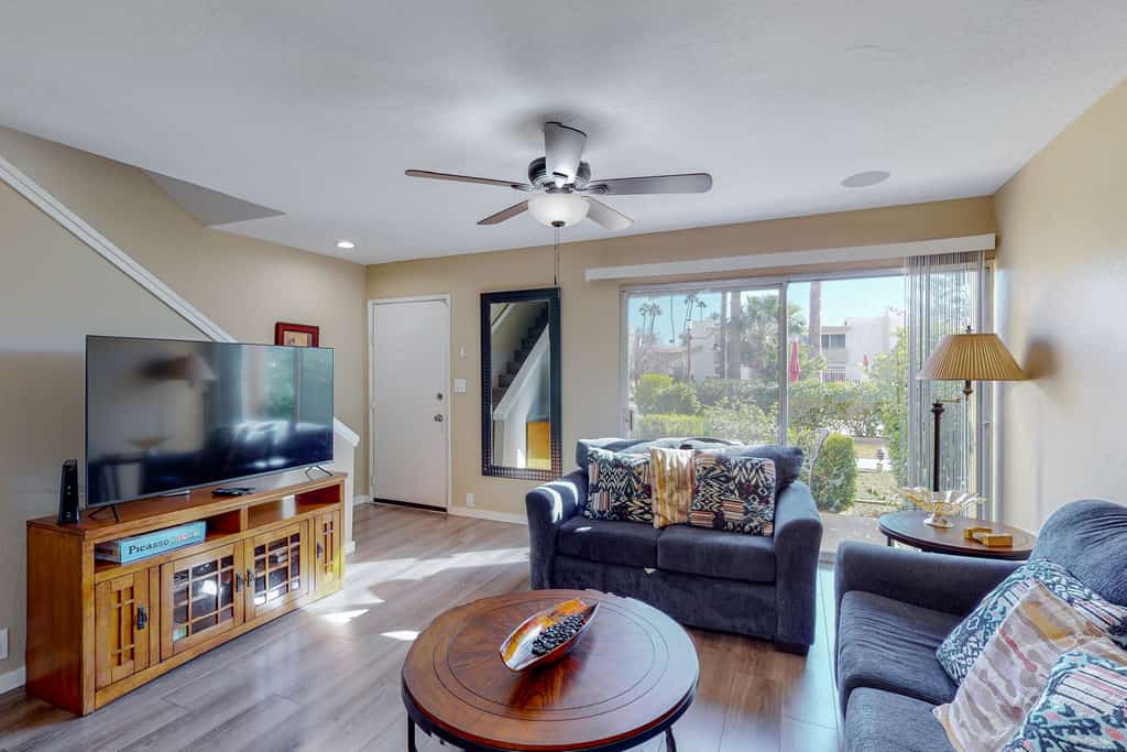 Sun-filled condo with a patio, central AC, pool & grill access - great location