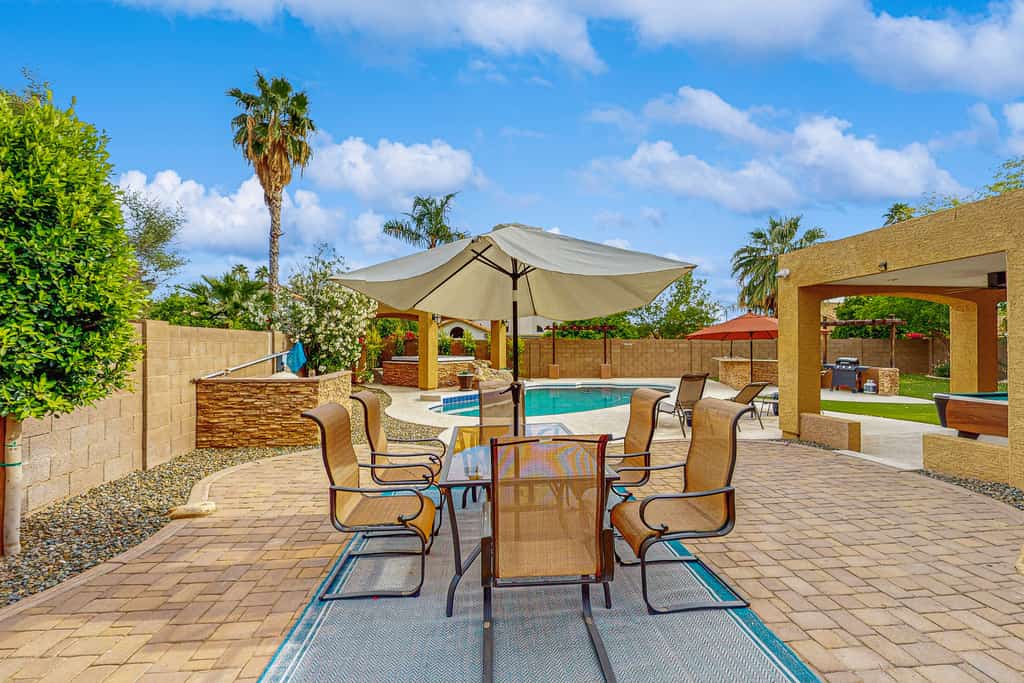 Scottsdale Style Meets Family-Friendly Fun! Spacious home with a yard and pool.